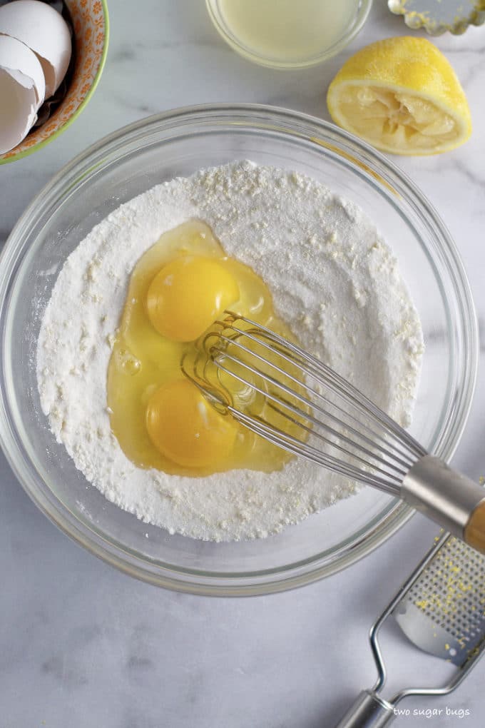 sugar, lemon zest and eggs in a mixing bowl