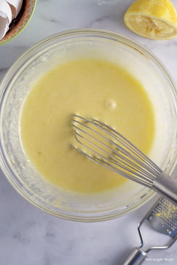 lemon mixture in a mixing bowl with a whisk
