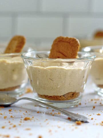 3 ingredient biscoff cookie mousse in a glass serving cup with a spoon