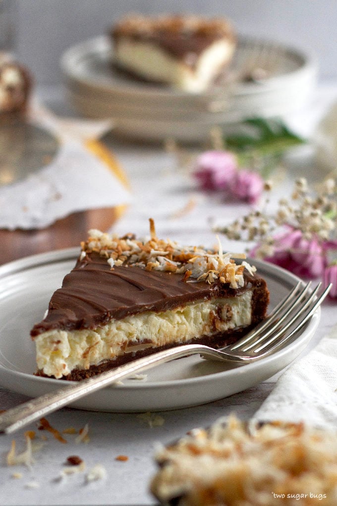 slice of almond joy pie on a plate with a fork