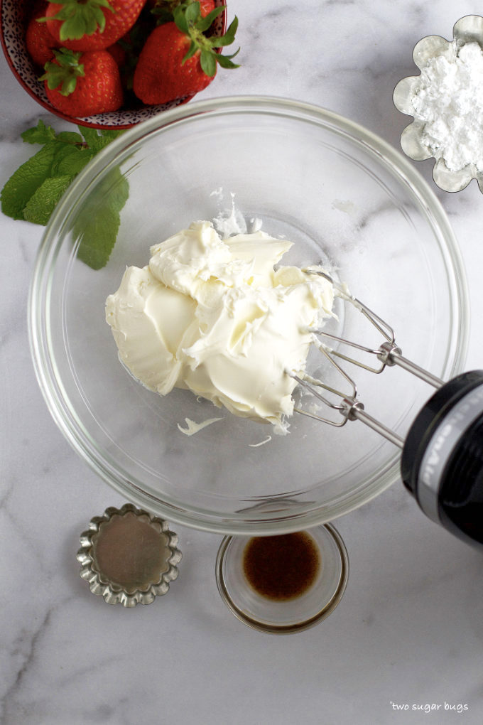 mascarpone in a glass bowl with a handmixer