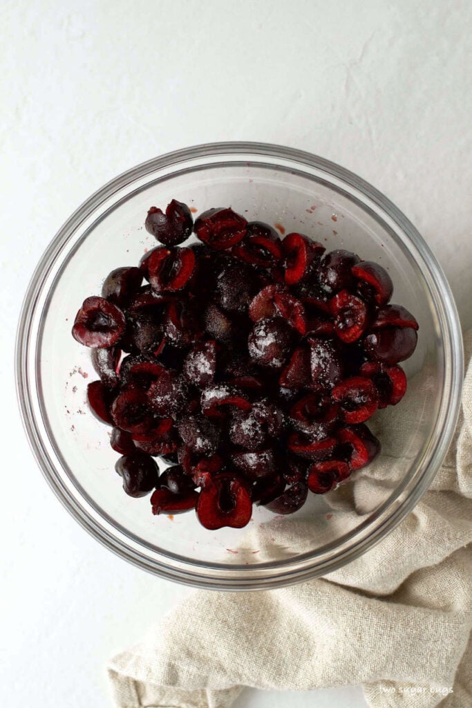 bowl of cherries with granulated sugar and vanilla