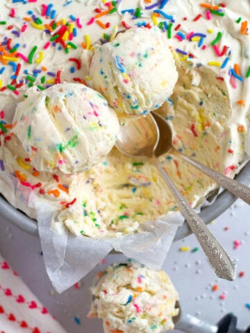 three scoops of funfetti ice cream with two spoons
