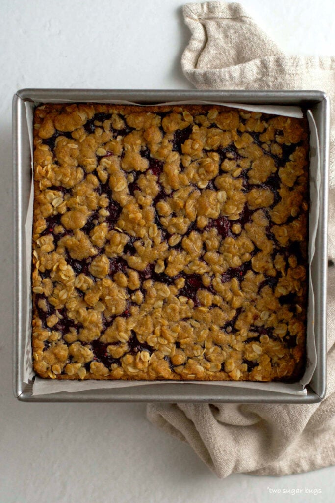 baked berry crumble bars in the pan