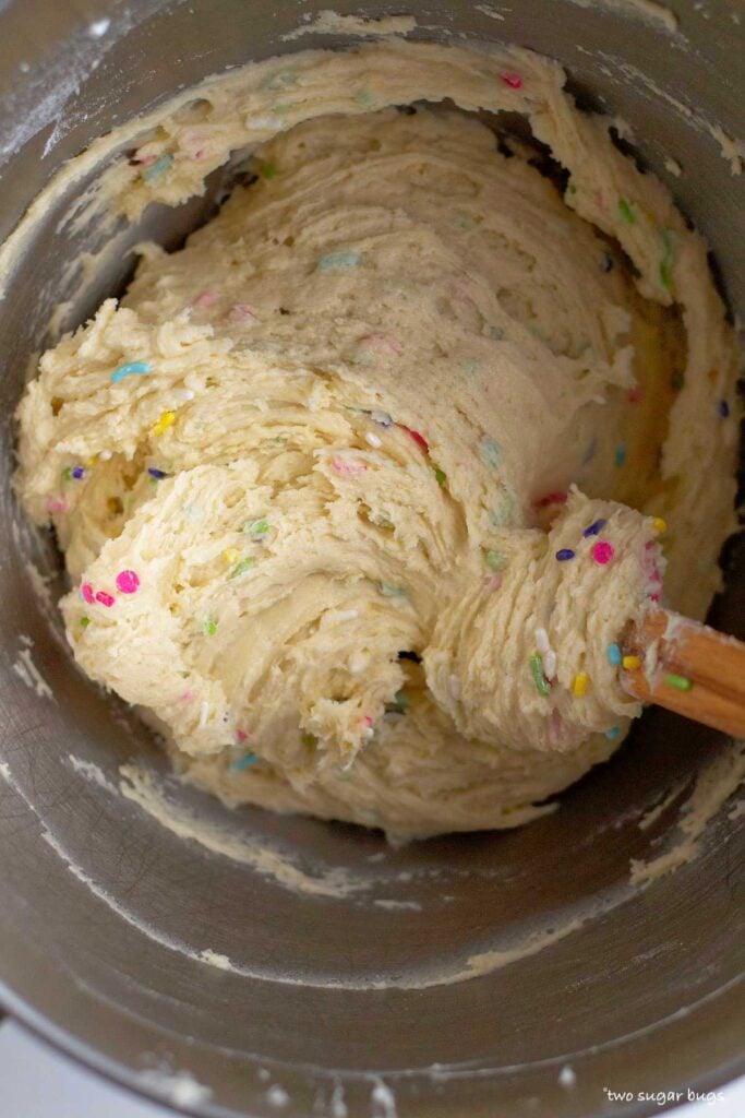 mixed sugar cookie bar dough in mixing bowl