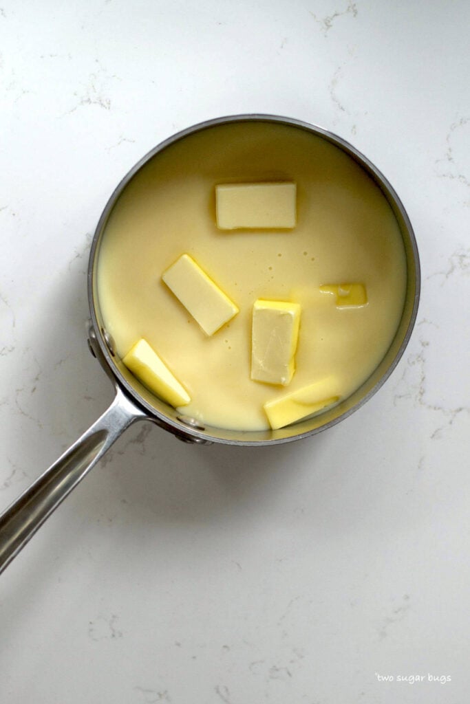 butter and sweetened condensed milk in a saucepan