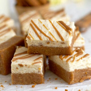 cookie butter bars stacked in a pile