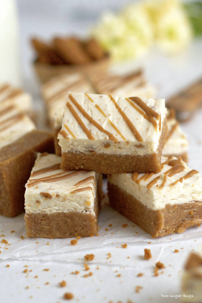 cookie butter bars stacked in a pile