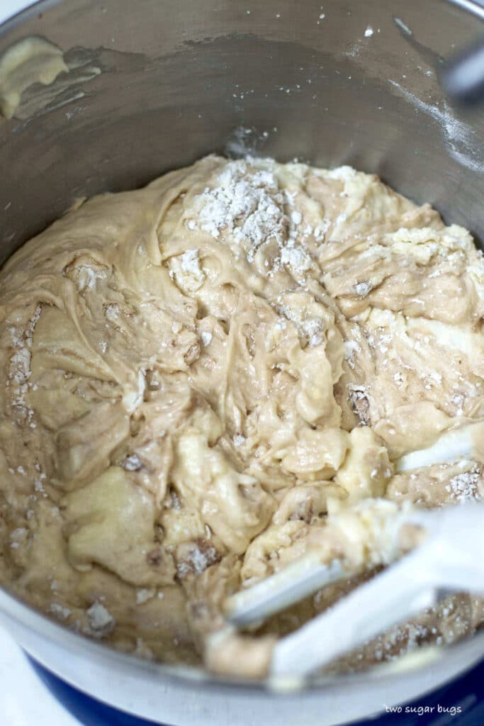 cake batter with large streaks of flour still showing