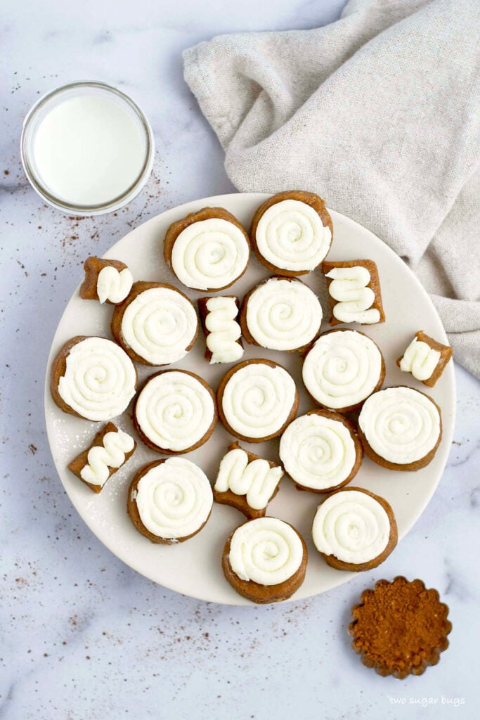 plate of cookies with a glass of milk
