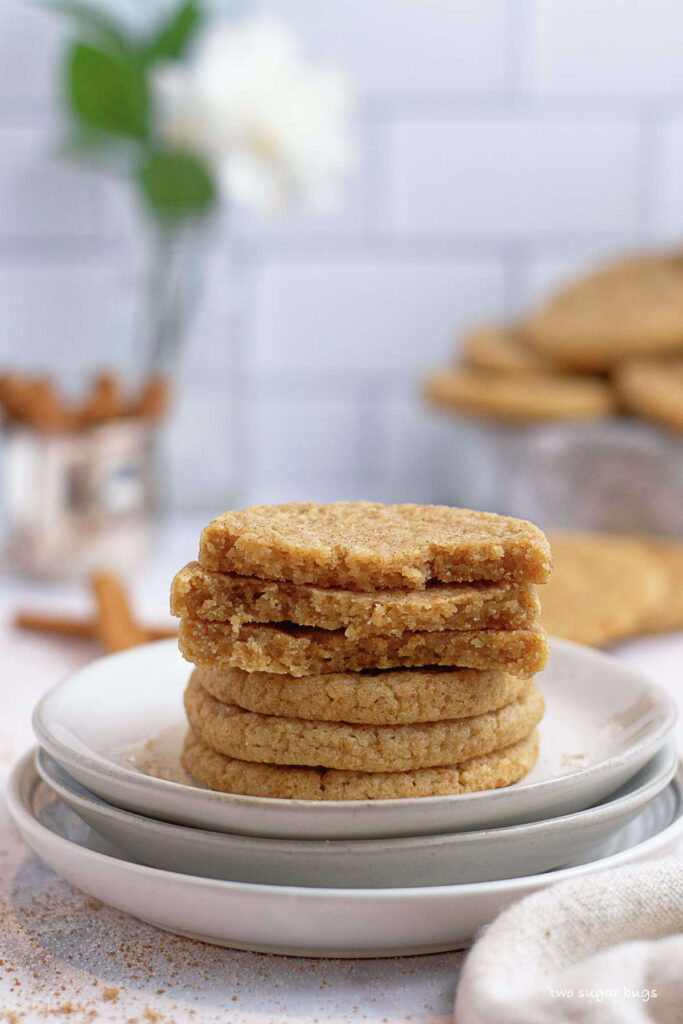 apple cider sugar cookies on a stack of plates