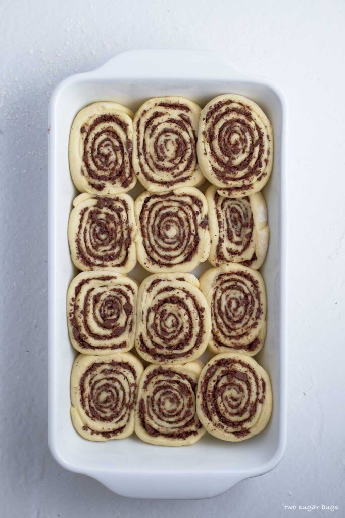 proofed rolls in the baking pan