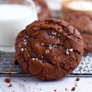 salted brownie crinkle cookie on a cooling rack