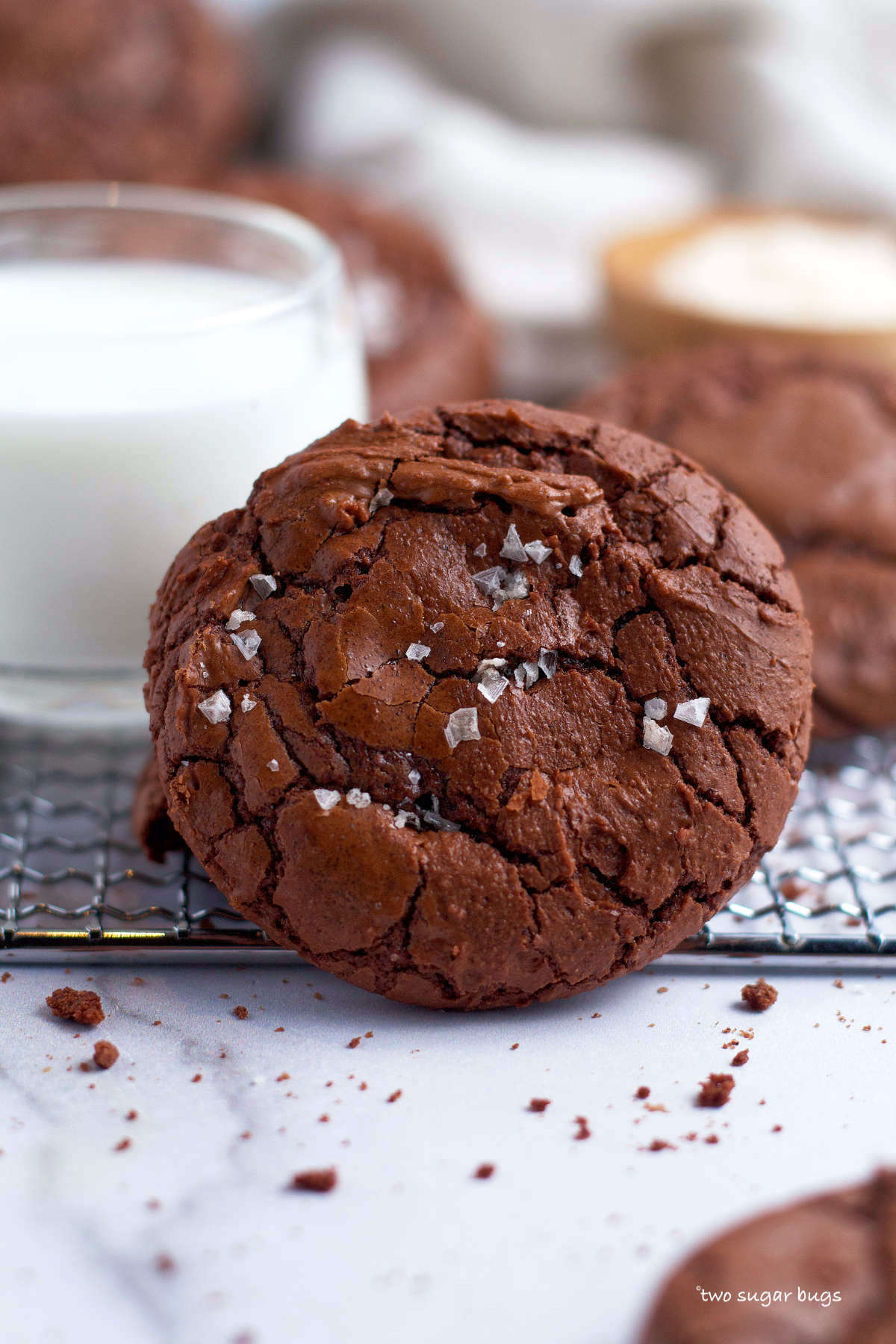 salted brownie crinkle cookie on a cooling rack