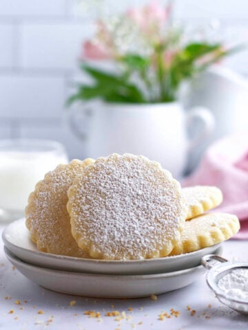 soft almond sugar cookies on a plate