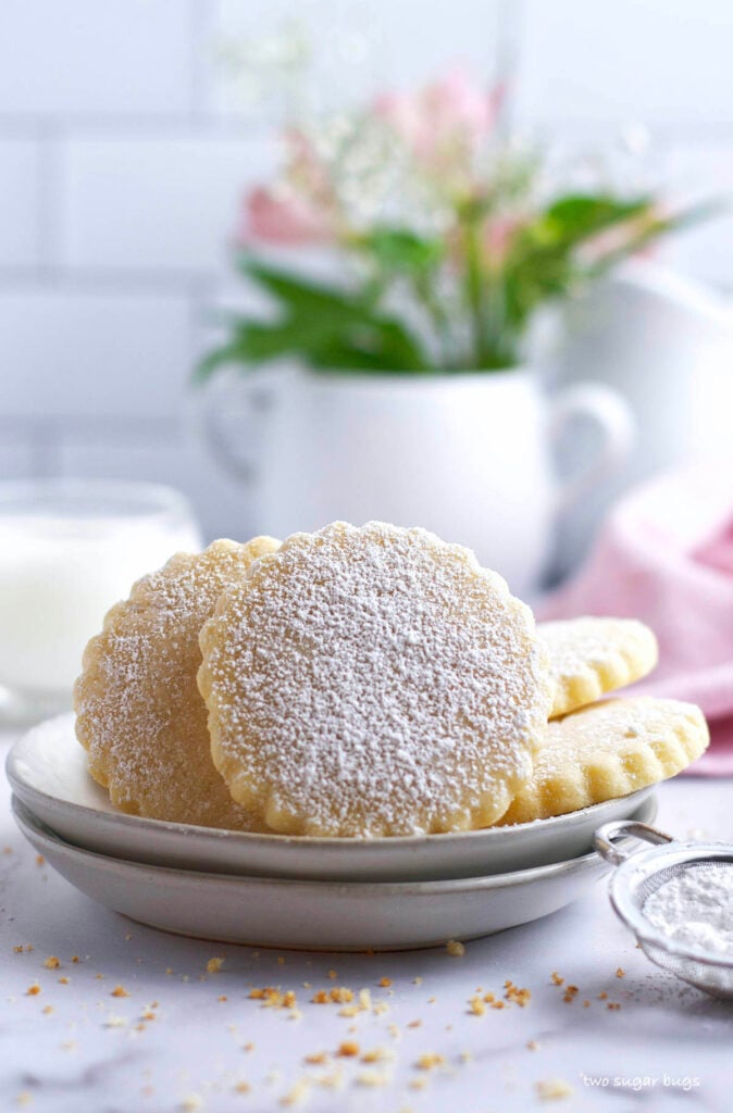 soft almond sugar cookies on a plate