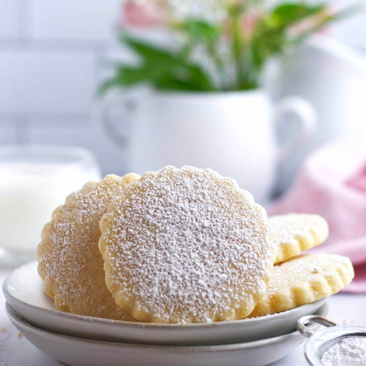 soft almond sugar cookies on a plate