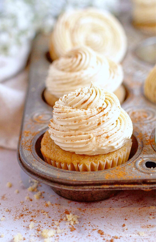 tall swirl of brown sugar buttercream on cupcakes