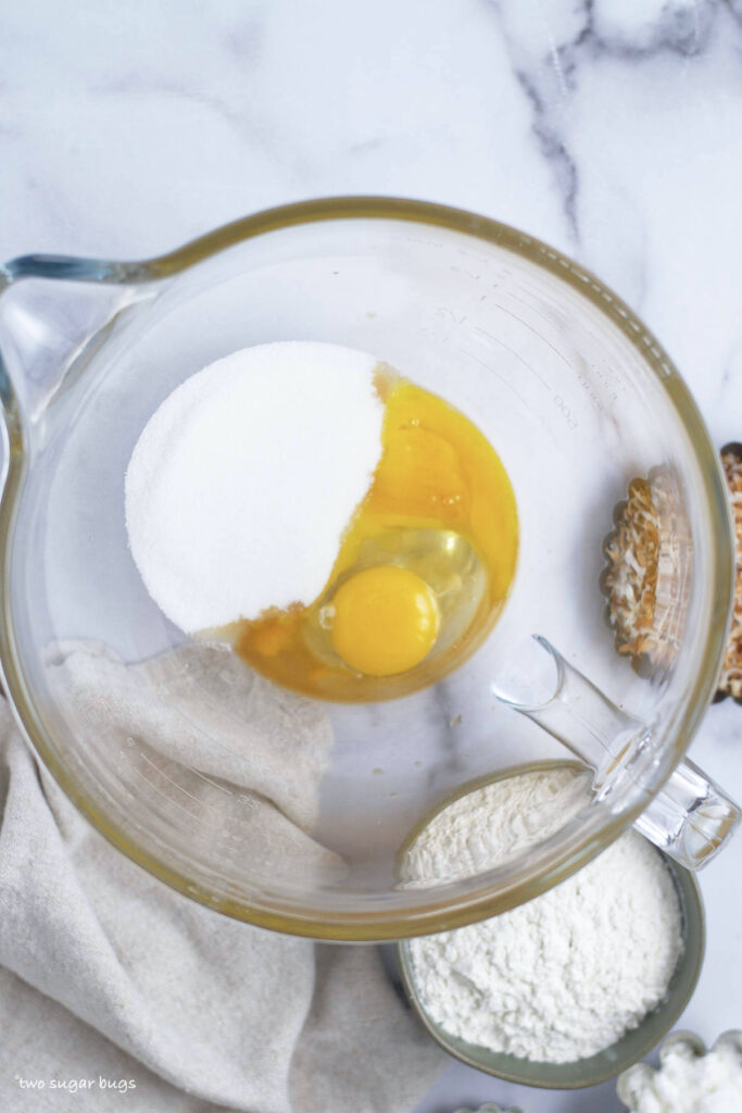 eggs, vanilla and sugar in a mixing bowl