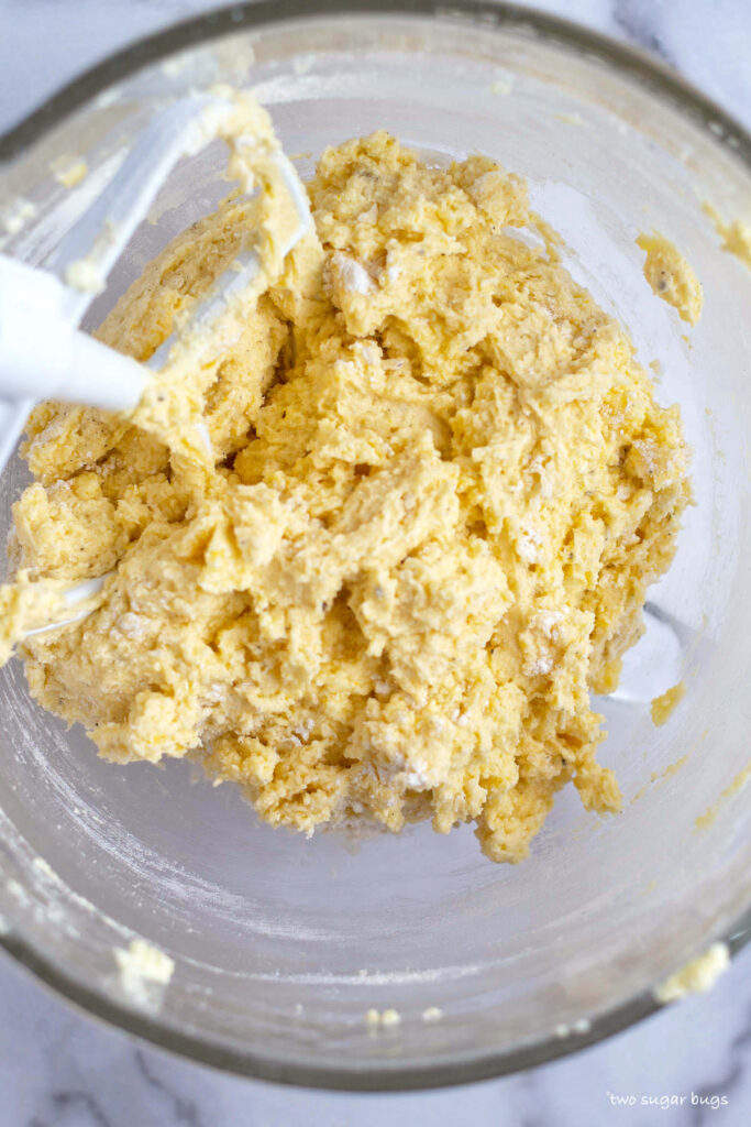 flour added to wet ricotta pound cake ingredients