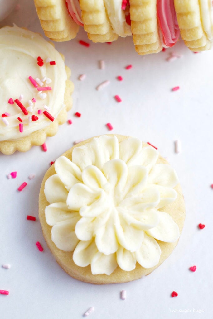 buttercream sugar cookie with flowered piping