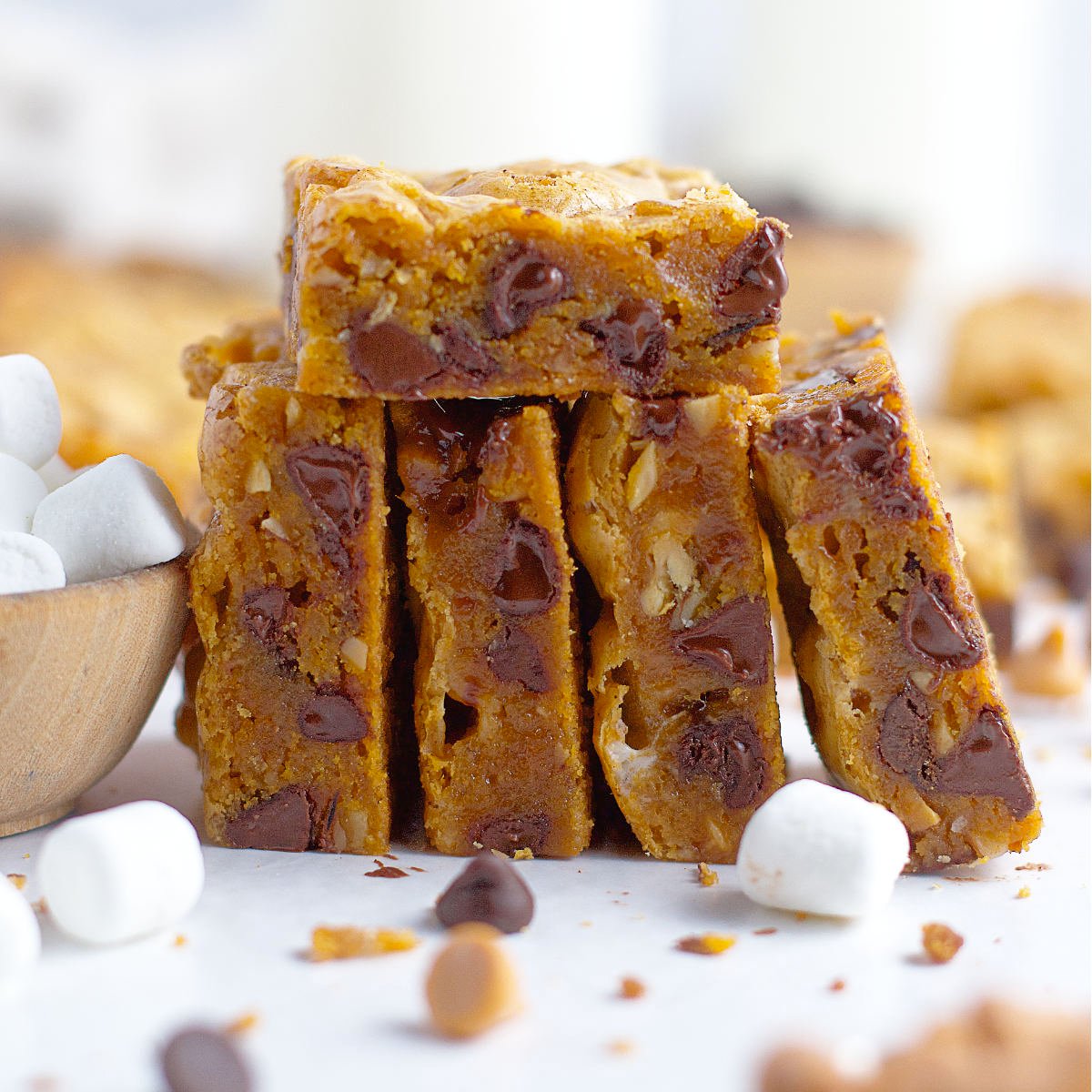 a stack of nordy bars with melty chocolate chips and marshmallows