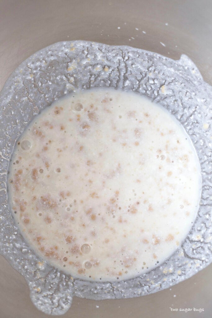 yeast, buttermilk and sugar in a mixing bowl