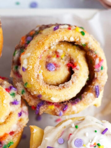 unclose look at the swirls on a baked funfetti cinnamon roll