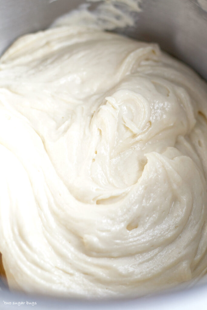 fluffy white chocolate cupcake batter in a bowl