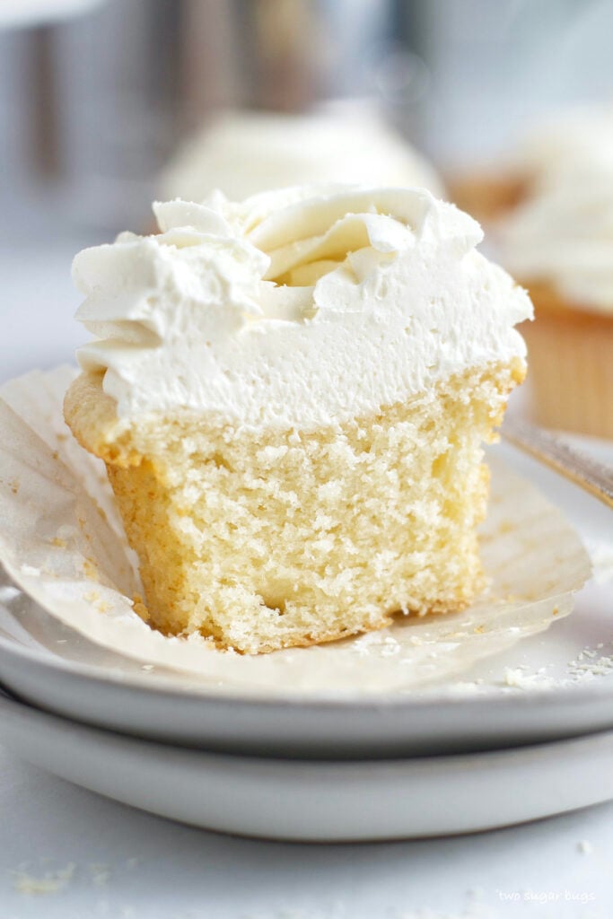 inside look at a white chocolate cupcake on a plate