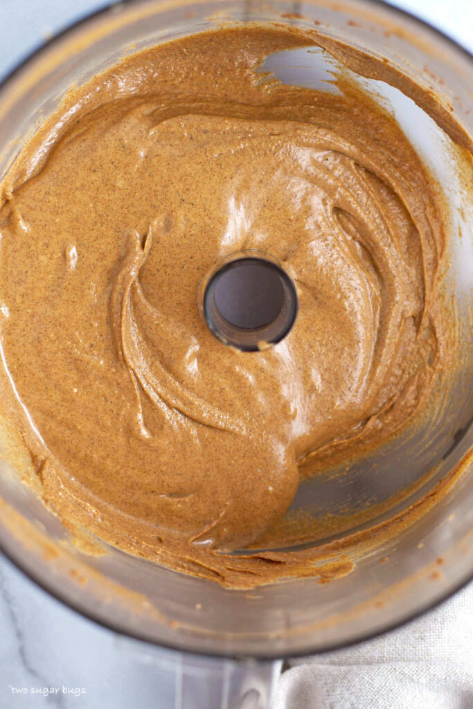 finished homemade gluten free cookie butter in a food processor bowl
