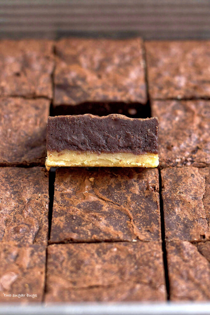 brownie square showing shortbread crust layer