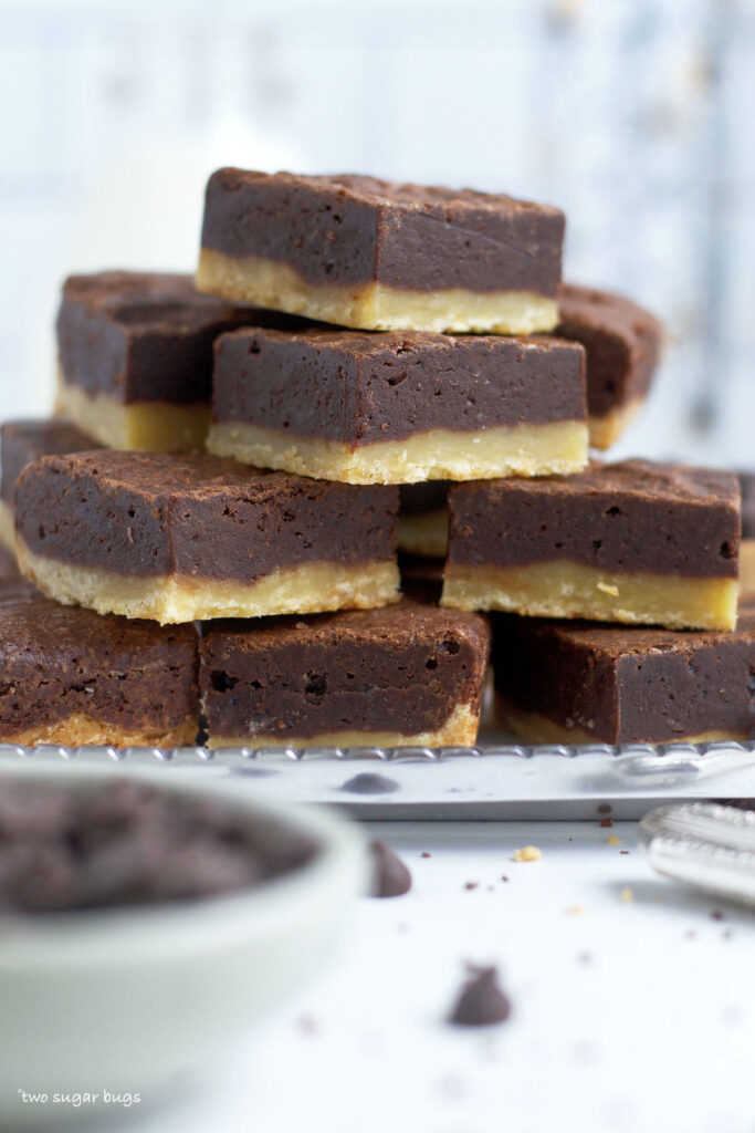 a pile of shortbread brownies on a tray