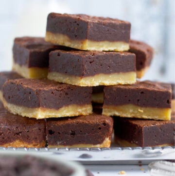 shortbread brownies stacked on a platter