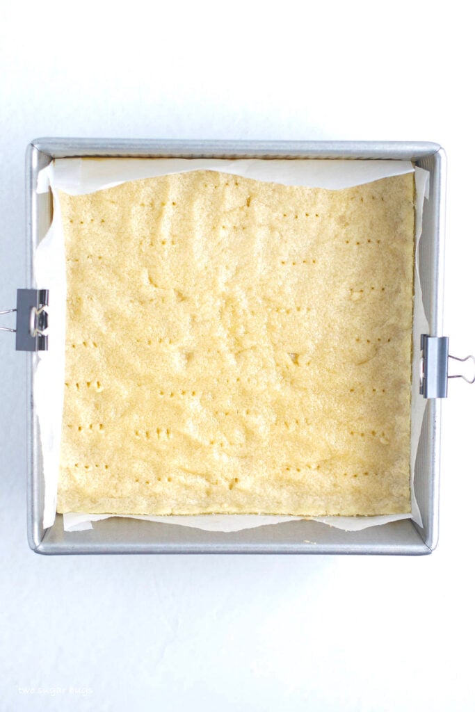 par baked shortbread crust in a baking pan