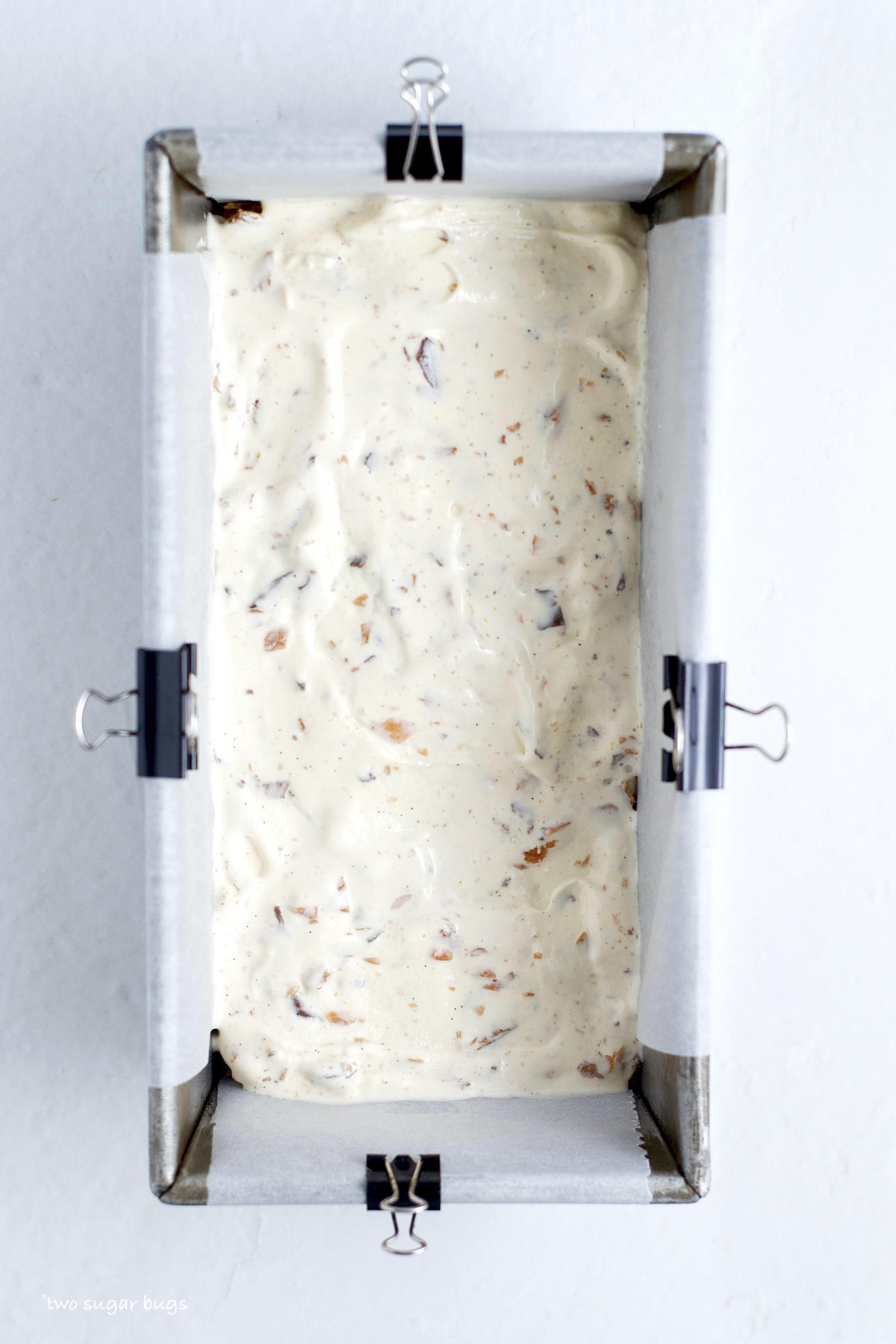 butterfinger ice cream layer in a loaf pan