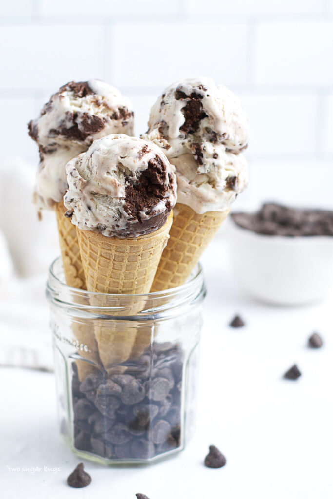 three ice cream cones in glass jar