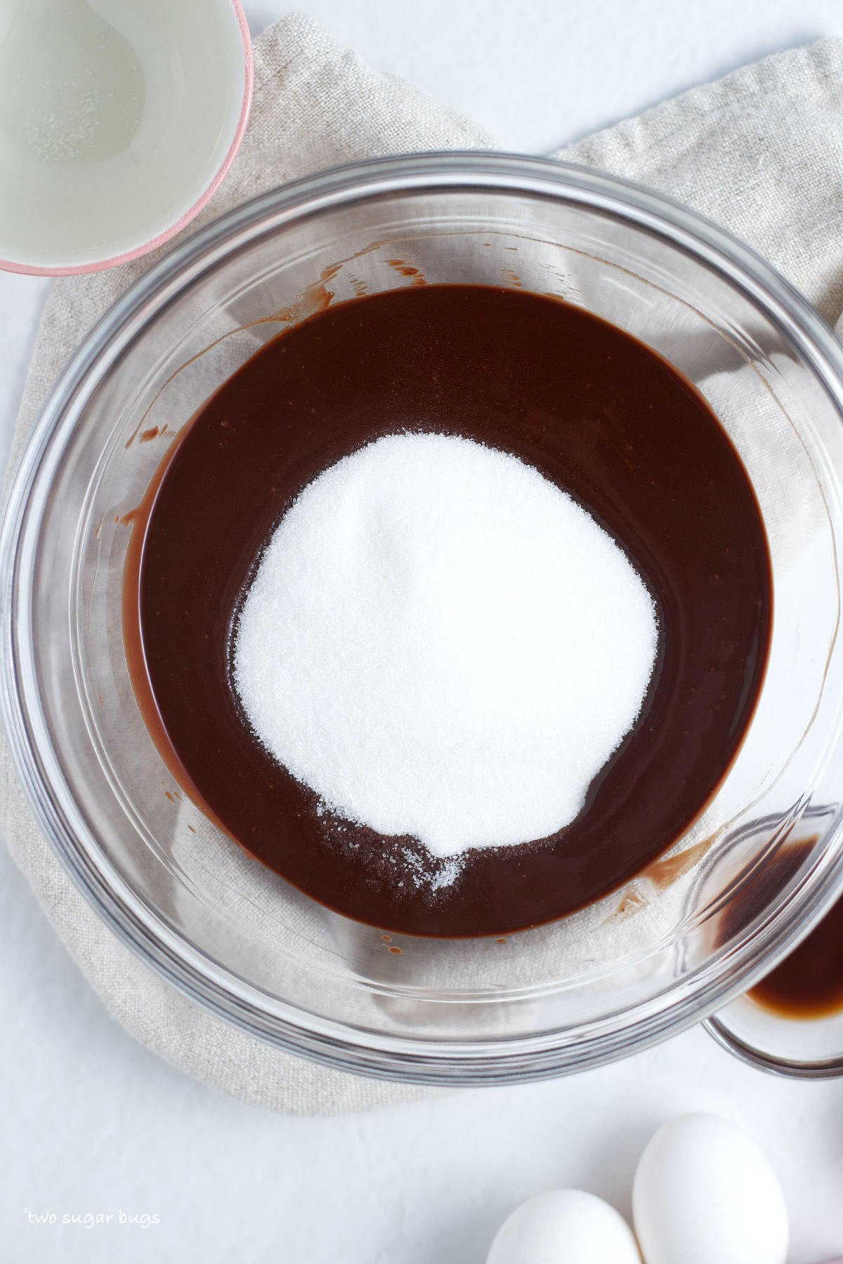 sugar added to melted chocolate and butter