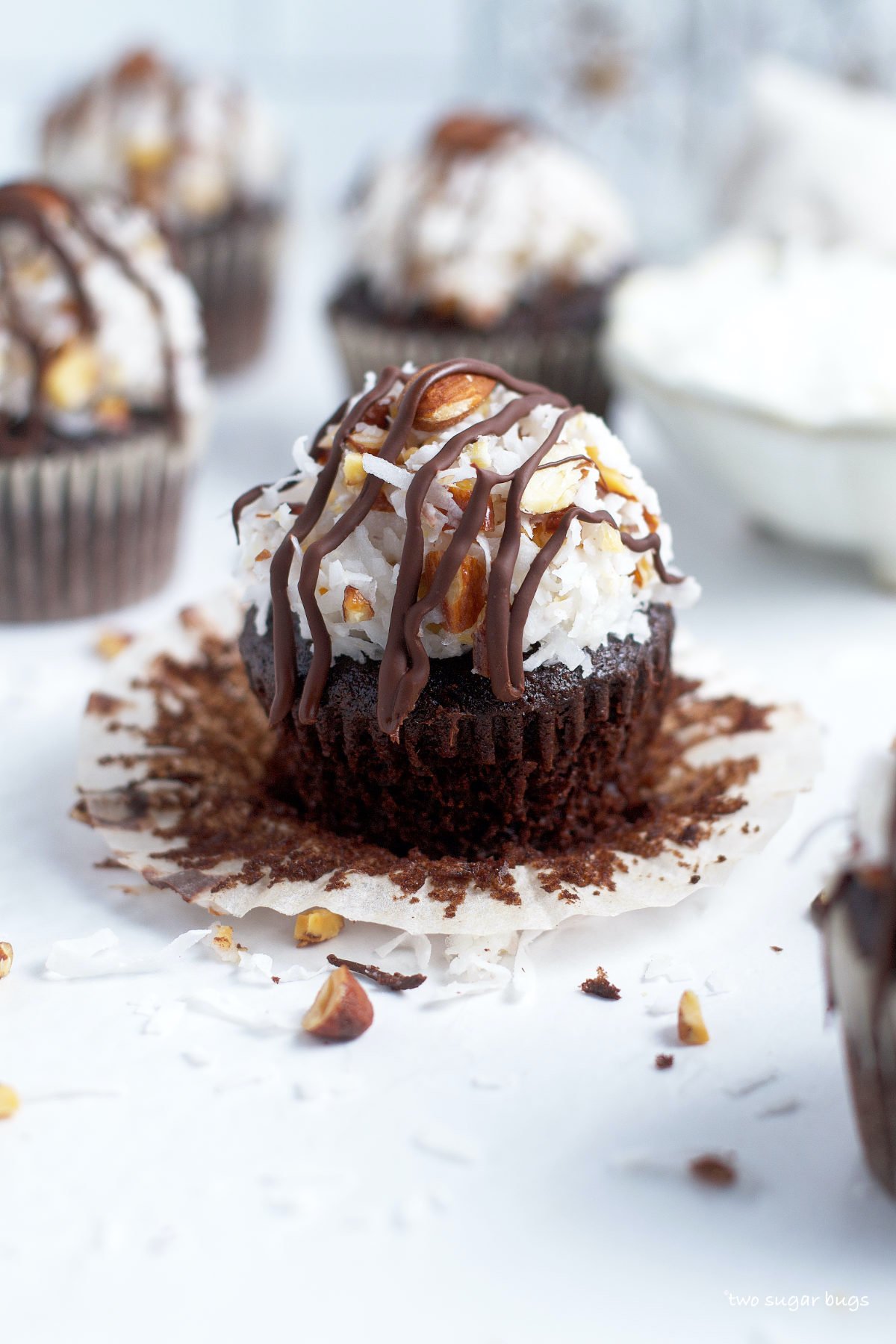 almond joy cupcake with the wrapper pulled down