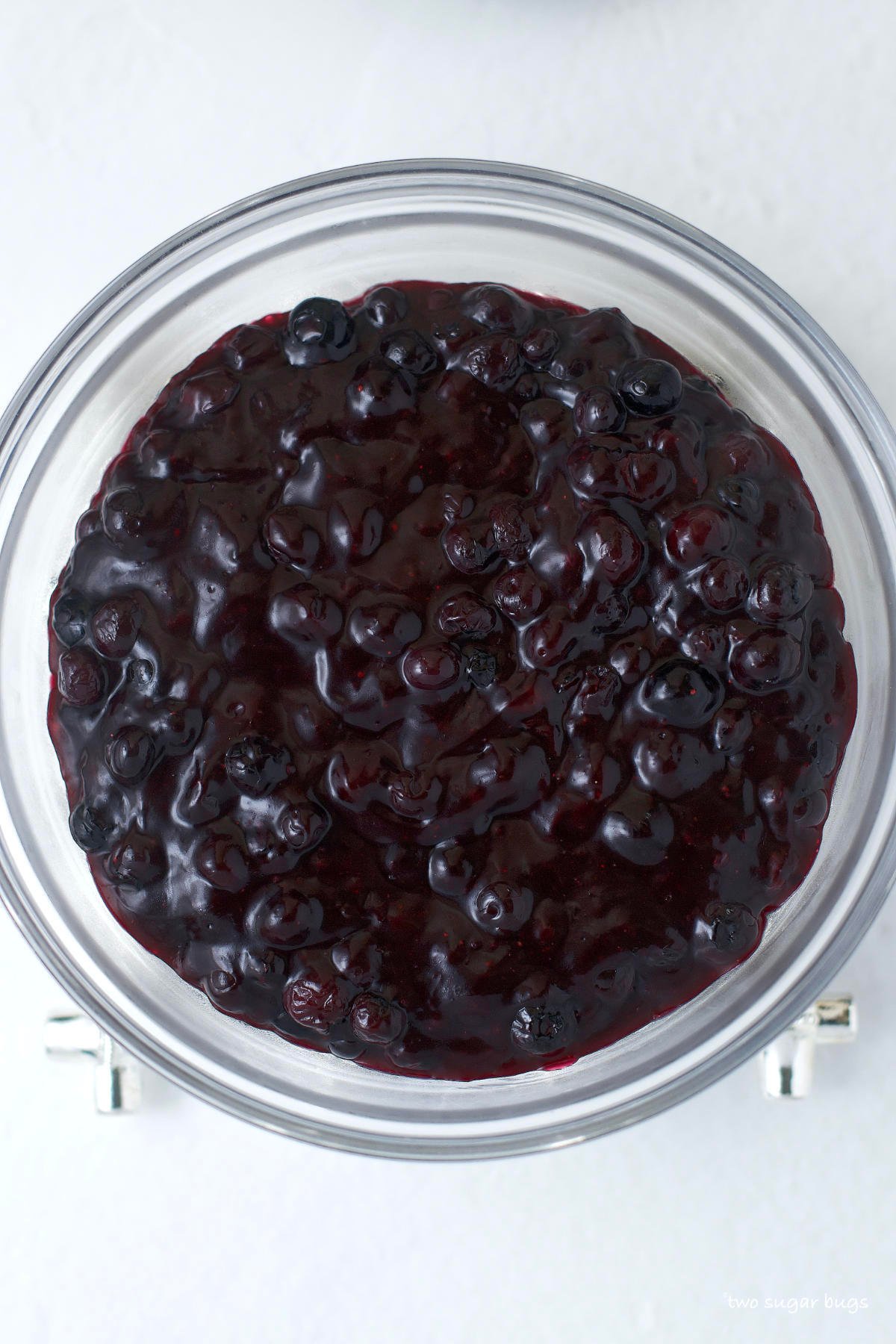 finished blueberry pie filling in a glass bowl
