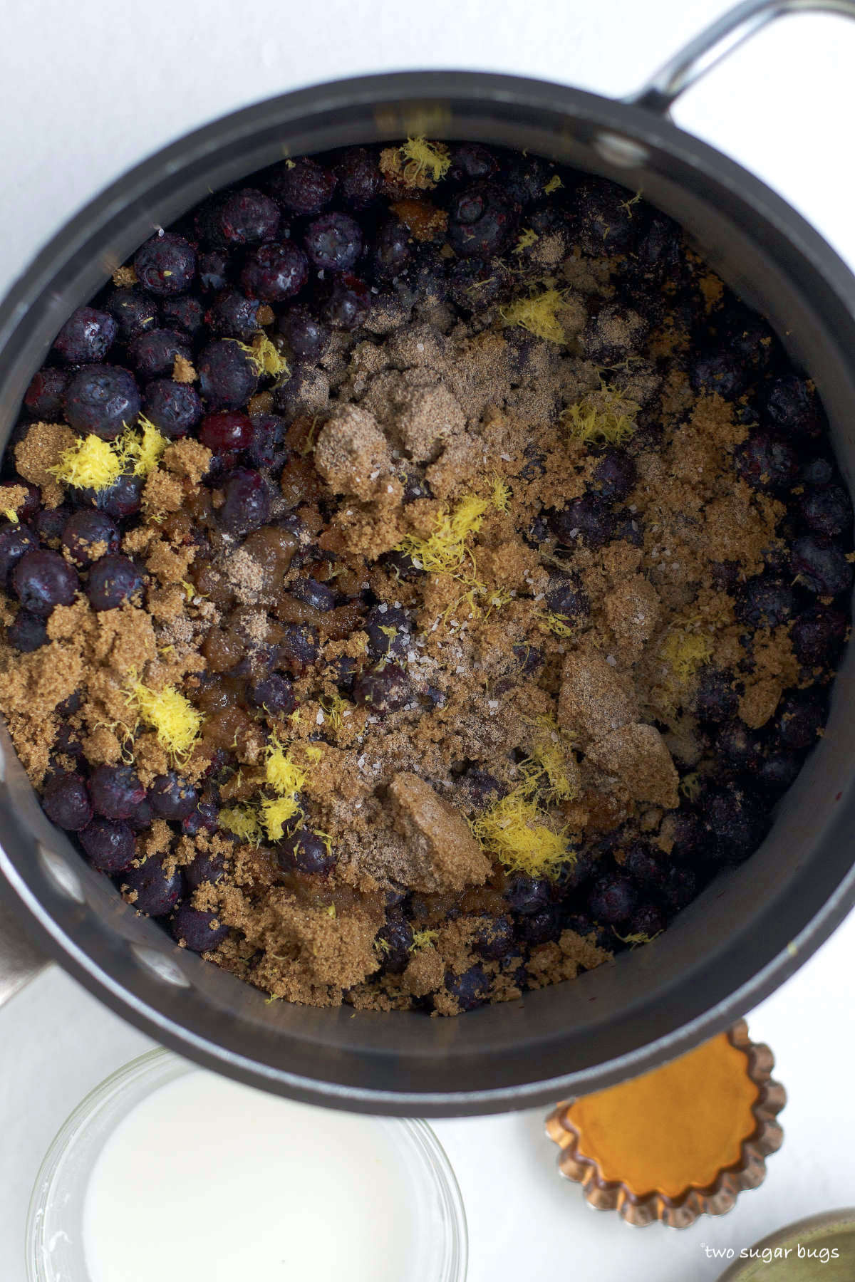 blueberries, brown sugar, lemon zest, lemon juice and cardamom in a sauce pan