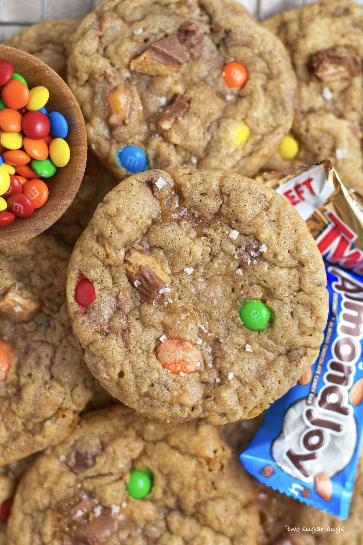 candy bar cookies with a bowl of m&m's and mini candy bars