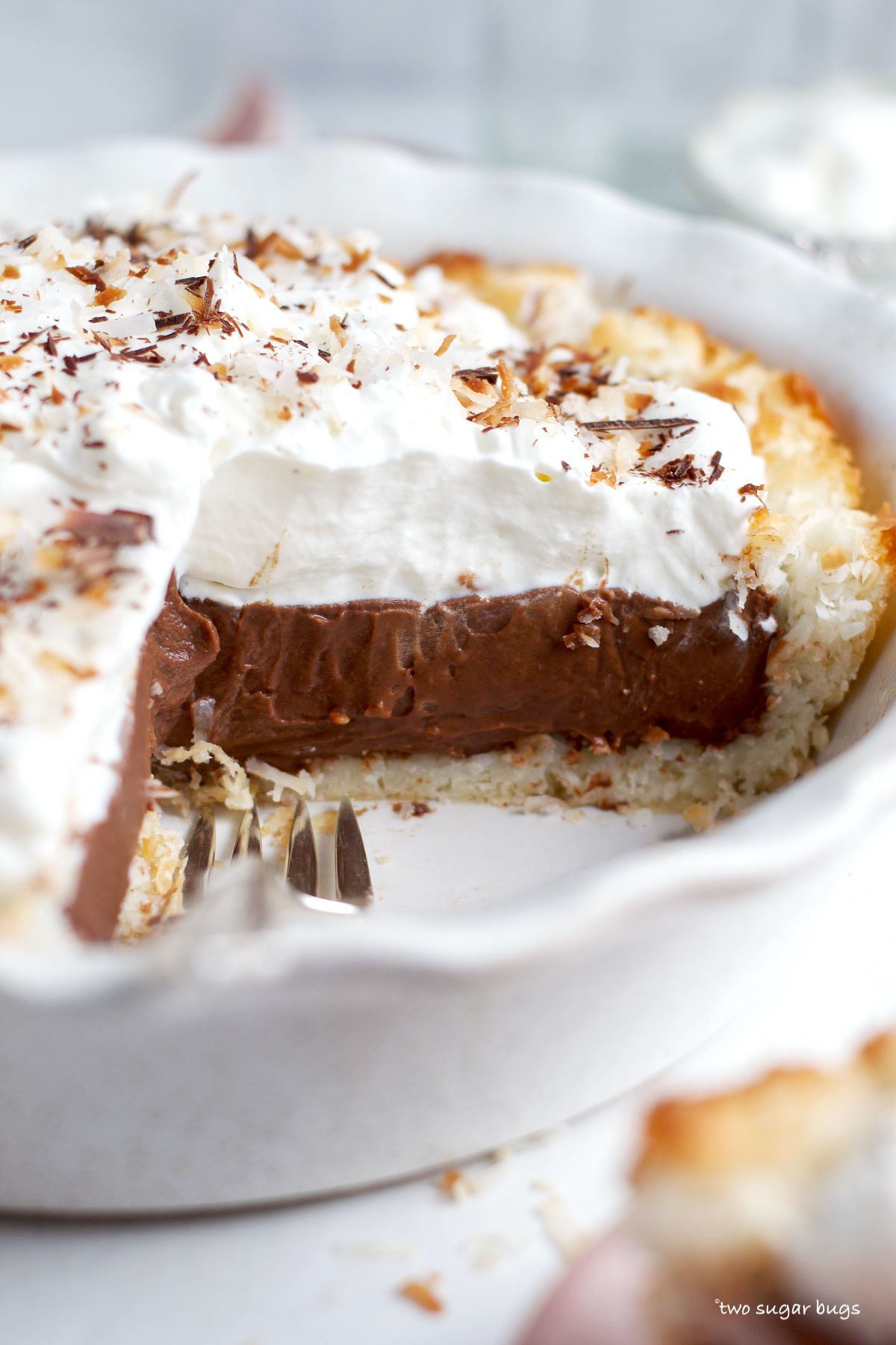 layers of coconut, chocolate and whipped cream