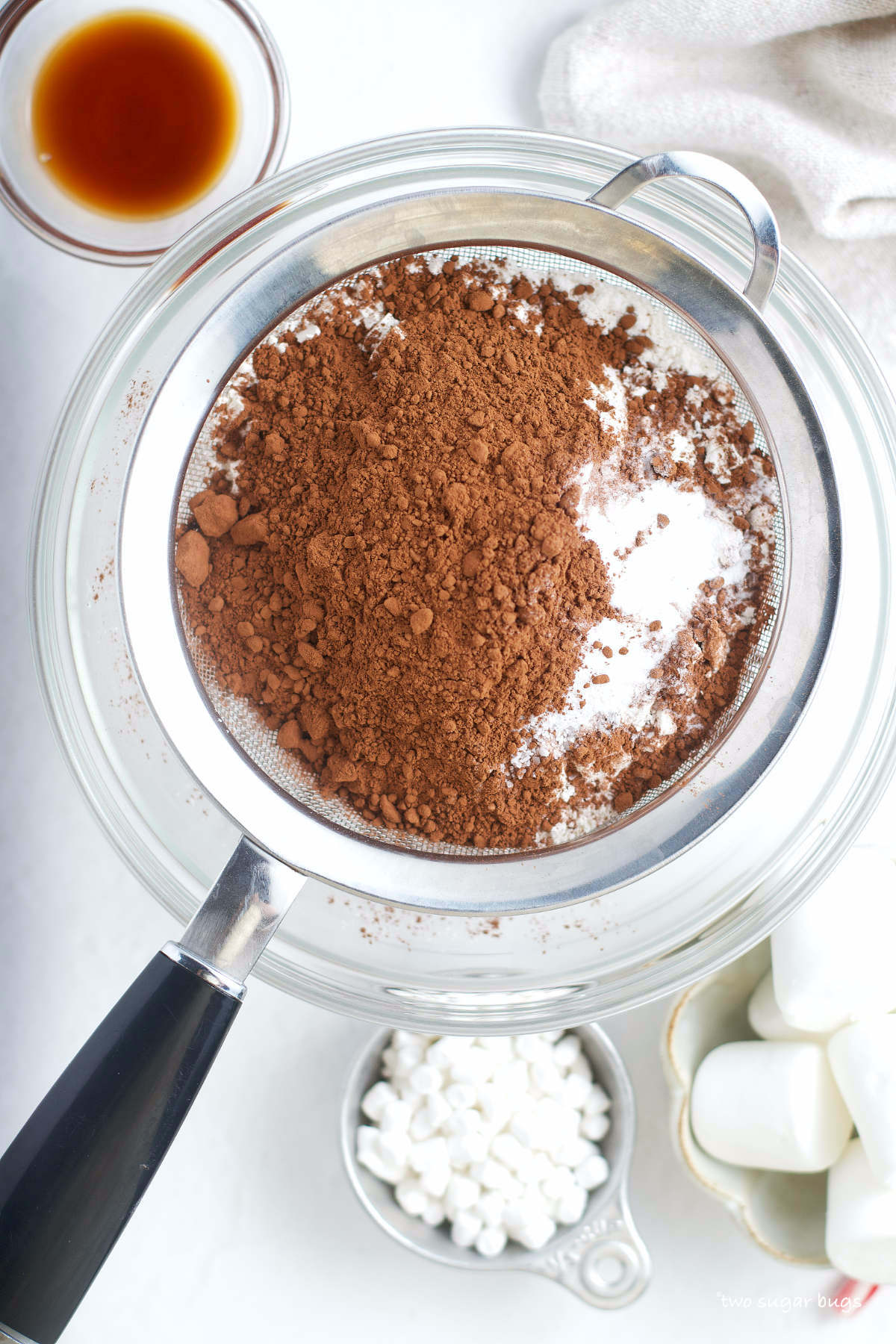 flour, cocoa powder, baking soda and salt in a sifter
