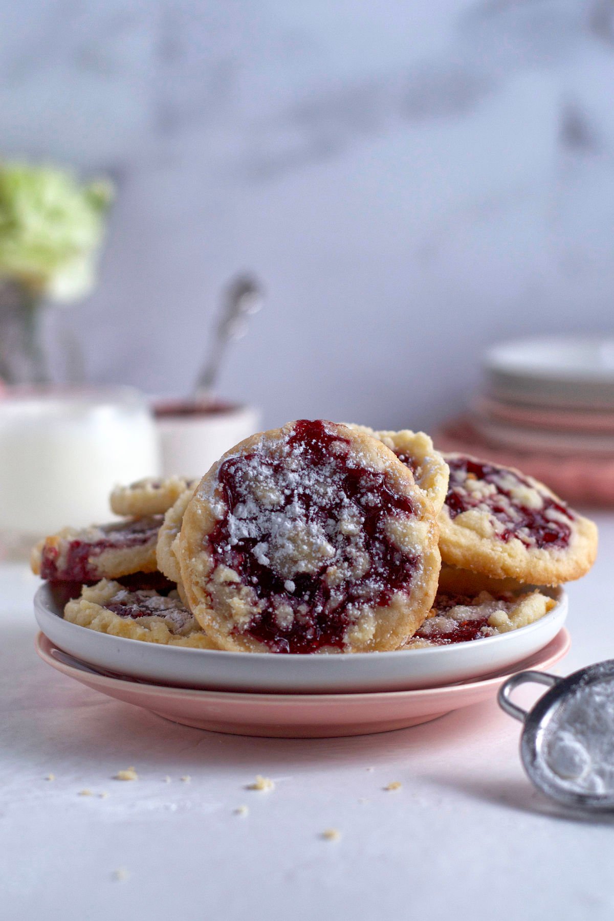 raspberry crumble cookies sitting on a plate