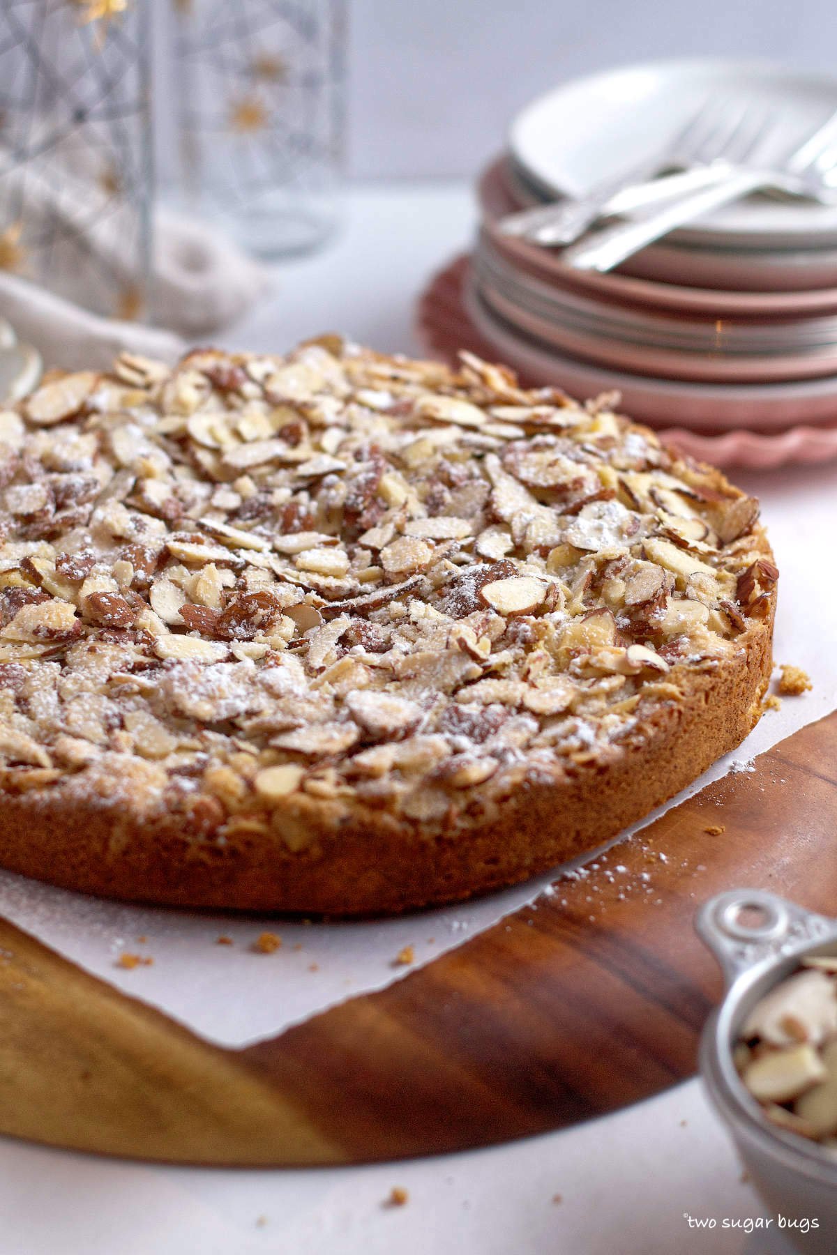 Italian cake with almond topping on a serving platter