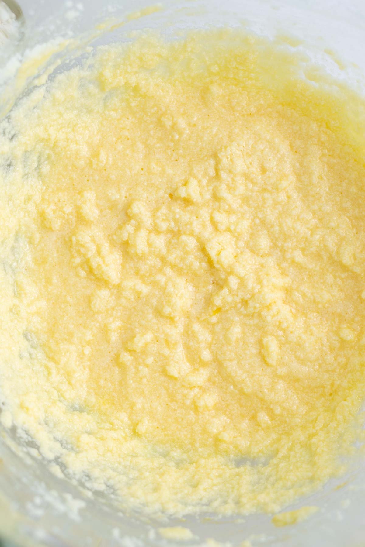 cardamom cake batter looking curdled after eggs and sour cream added