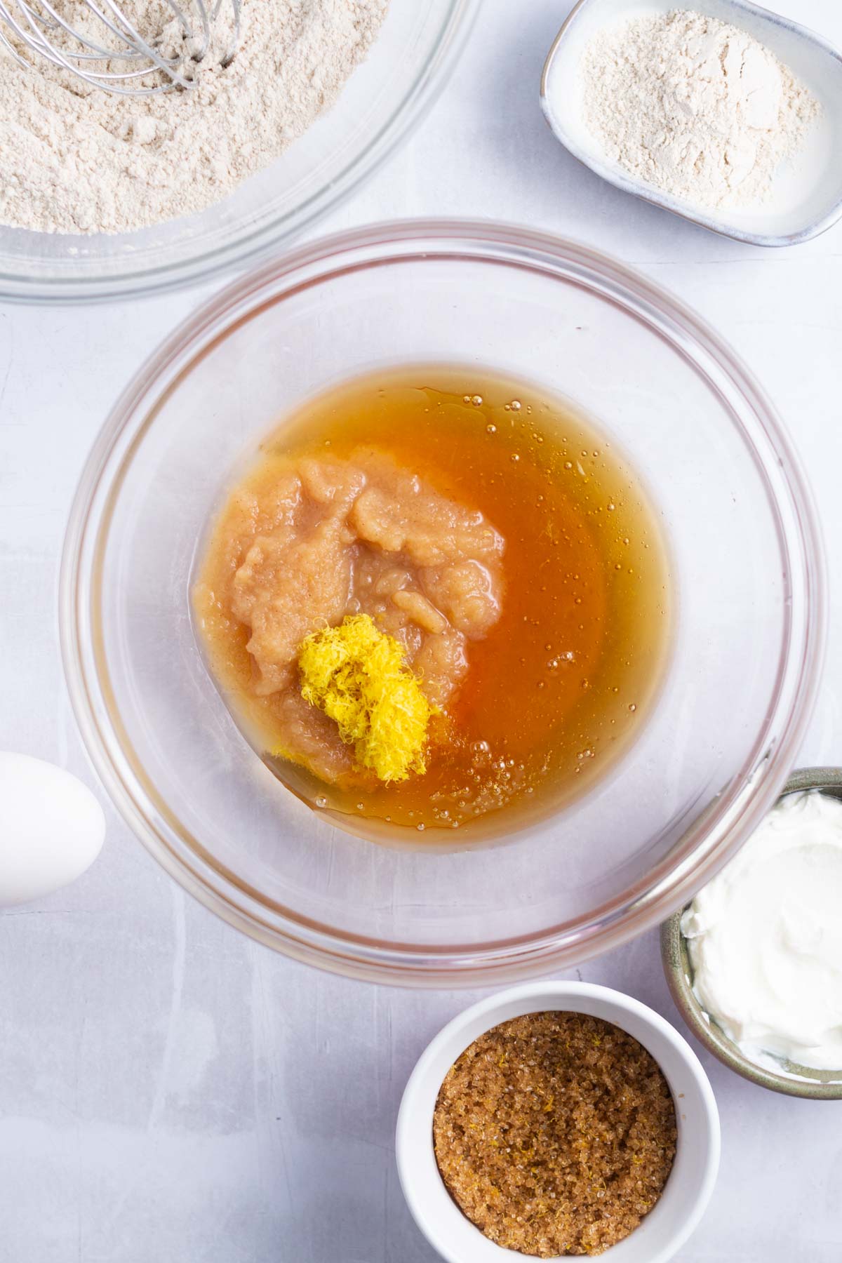 applesauce, honey and lemon zest in a bowl
