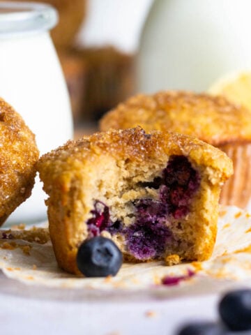 healthy lemon blueberry muffin with a bite missing