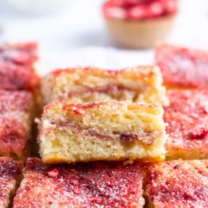 slice of crumb cake showing strawberry filling